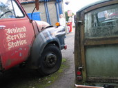 Behind garage