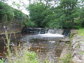 Stream by train station